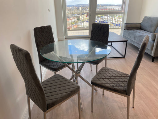 Lana Round Glass Dining Table with x4 Milan Chairs (Chairs available in white)